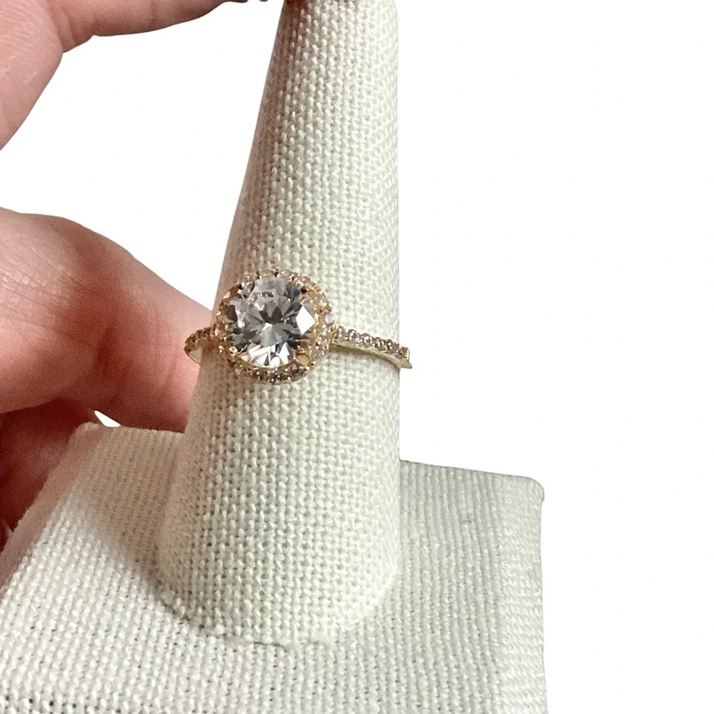 Round Clear Stone Set in Gold Tone Band Mini Side Stone Detailing Size 8.75